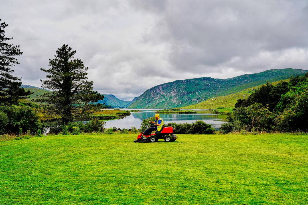 Groundcare machinery works on grass