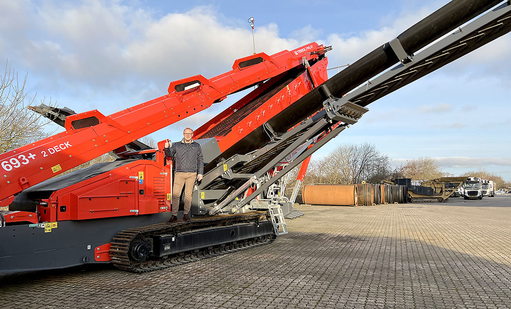 Klaus Meldgaard, General Manager at Meldgaard Handel in front of a Terex Finlay 693+